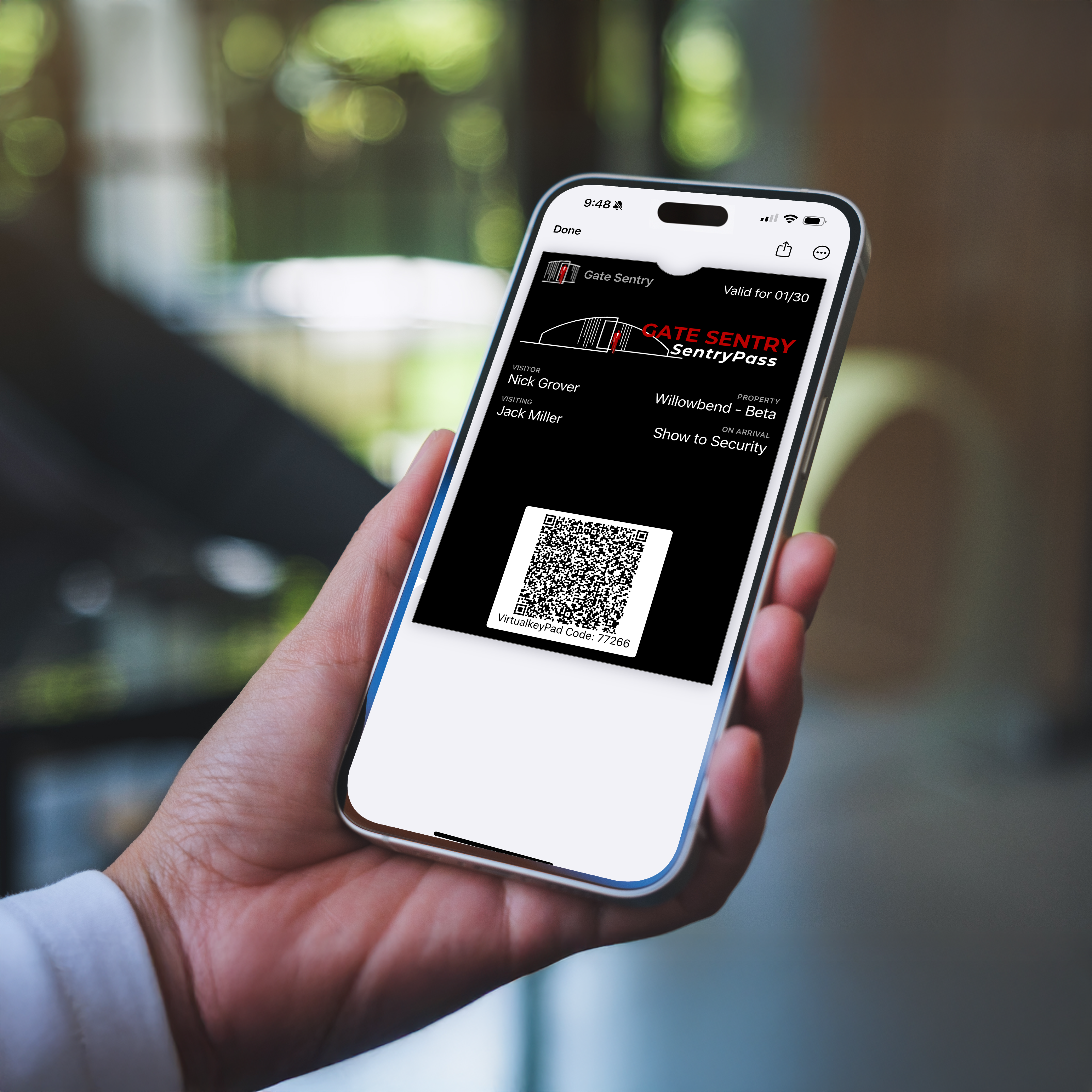 Visitor checking in with SentryPass mobile app and security tablet