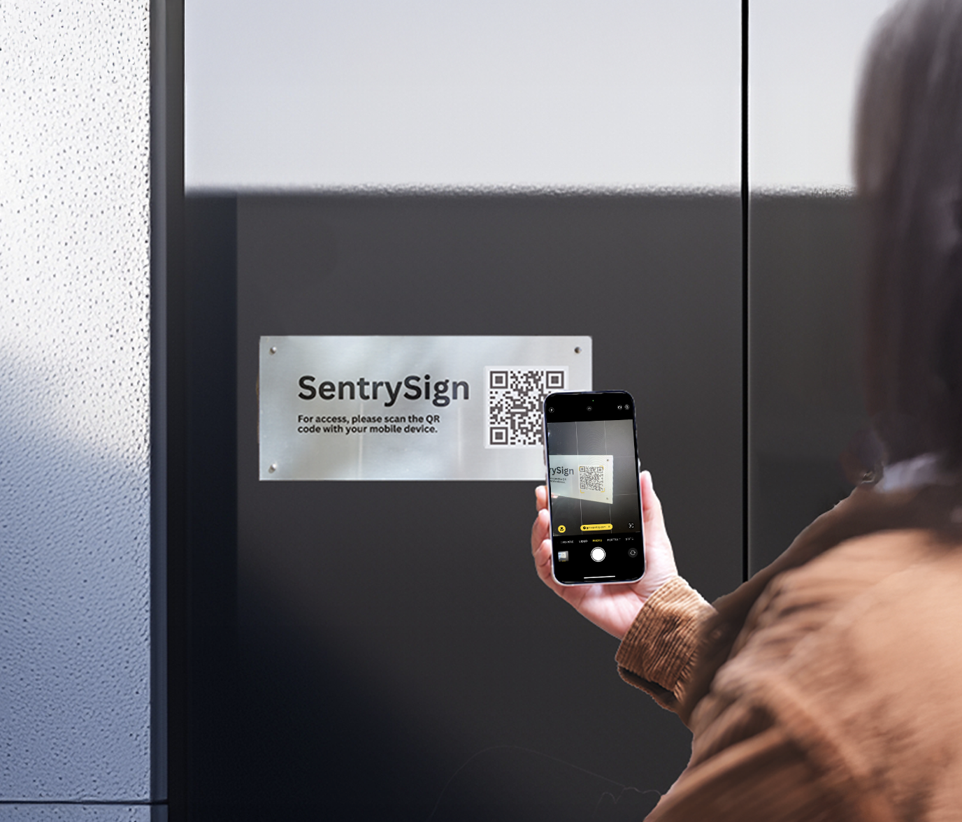 Digital sign with QR code for entry