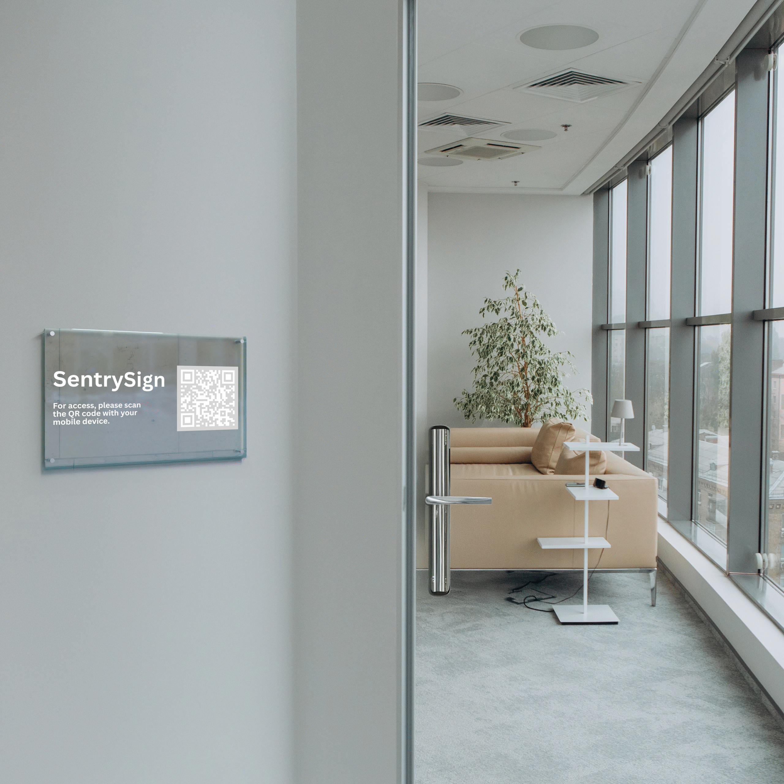 A tablet showing the Gate Sentry visitor check-in interface mounted on a modern stand.