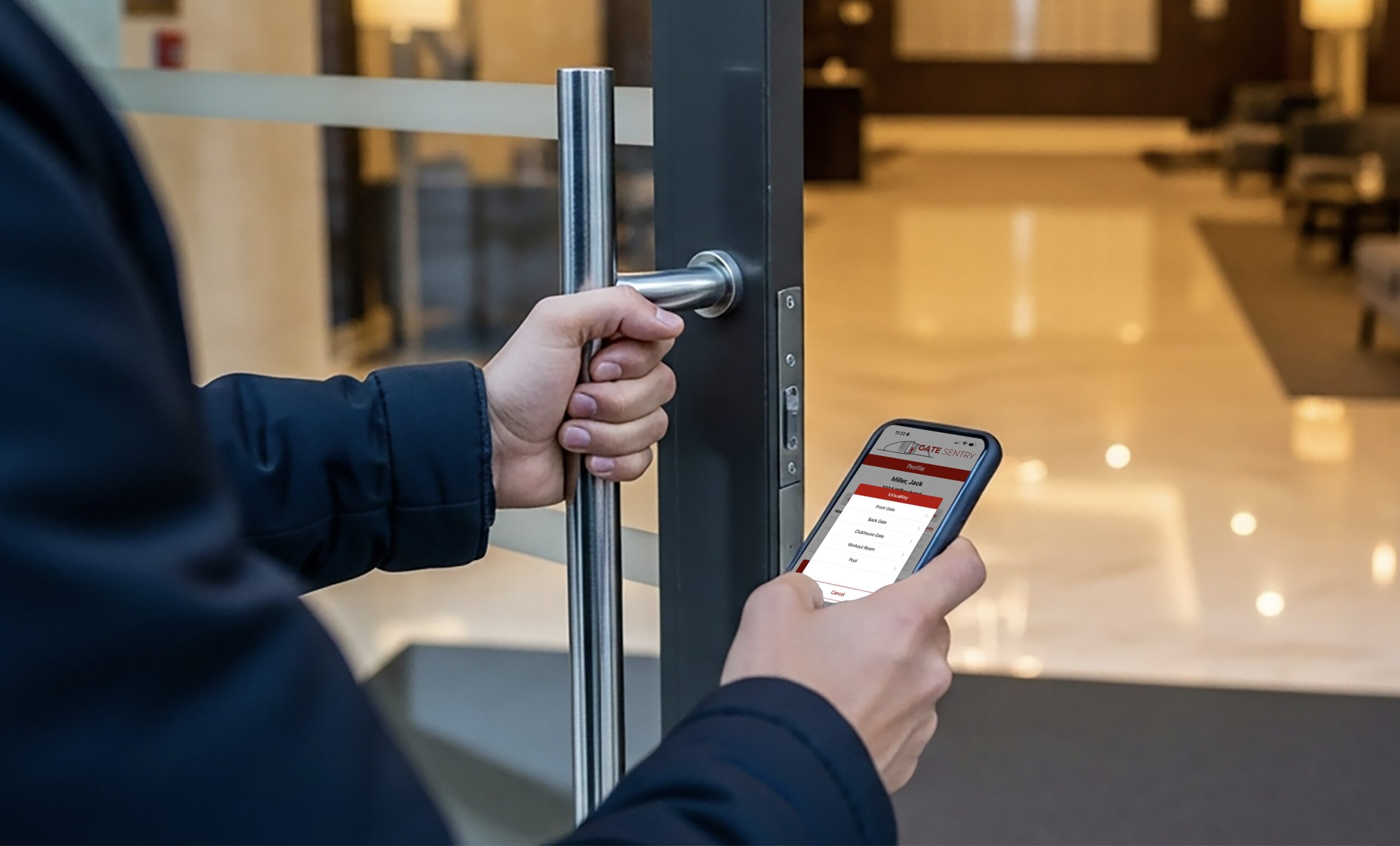 A person unlocking a door using their smartphone app, demonstrating keyless entry.